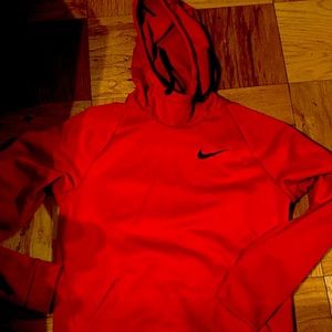 Red Nike hoodie. Size small